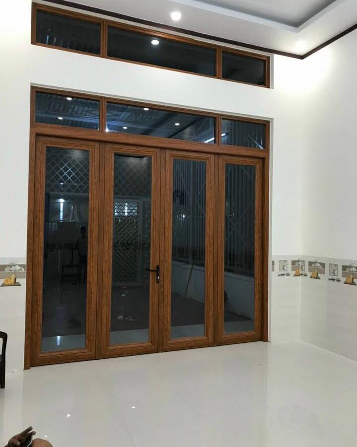 Bộ cửa đi nhôm kính 4 cánh mở quay