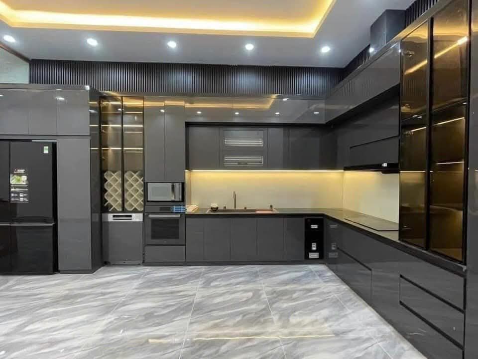 Tủ bếp chữ L hiện đai
