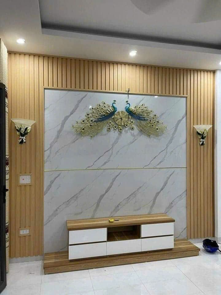 Thi công kệ vách tivi 