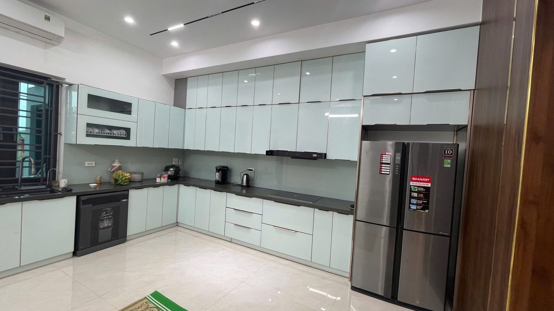 Thi công tủ bếp chữ L  