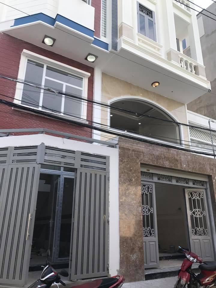 THI CÔNG NHÀ PHỐ LIỀN KỀ 2 MẶT TIỀN 