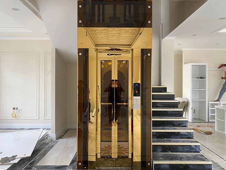 Thang máy tải khách 