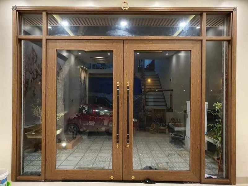 CỬA NHÔM THỦY LỰC MÀU GỖ HƯƠNG