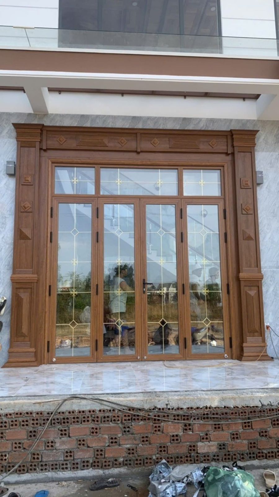 Thi công lắp đặt cửa nhôm kính
